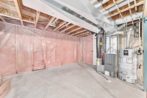 133 Prestwick Heights Se, Calgary, AB - Indoor Photo Showing Basement