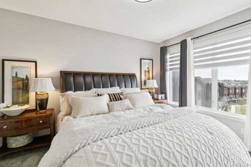 17 Royal Elm Green Nw, Calgary, AB - Indoor Photo Showing Bedroom