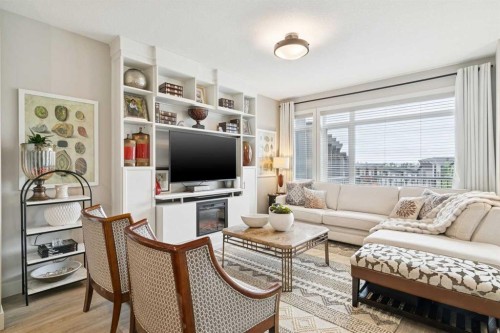 17 Royal Elm Green Nw, Calgary, AB - Indoor Photo Showing Living Room