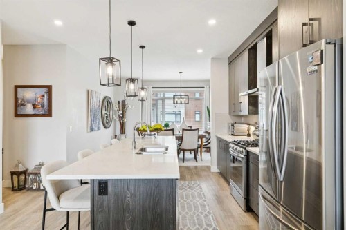 17 Royal Elm Green Nw, Calgary, AB - Indoor Photo Showing Kitchen With Stainless Steel Kitchen With Upgraded Kitchen