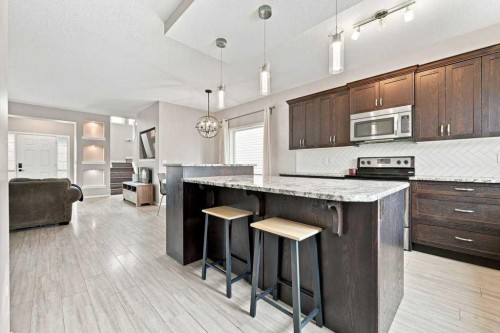 73 Legacy Common Se, Calgary, AB - Indoor Photo Showing Kitchen With Upgraded Kitchen