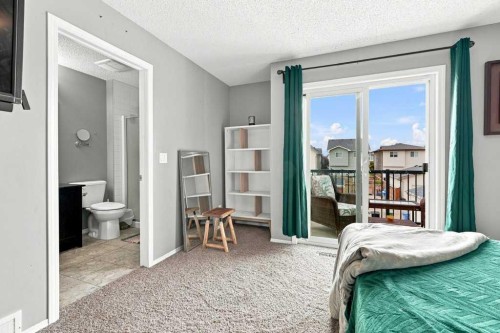73 Legacy Common Se, Calgary, AB - Indoor Photo Showing Bedroom