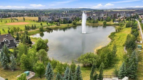 73 Legacy Common Se, Calgary, AB - Outdoor With Body Of Water With View
