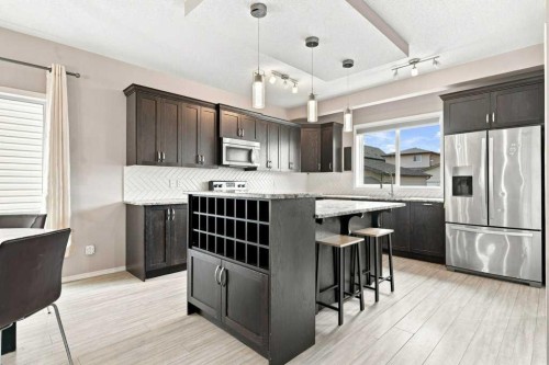 73 Legacy Common Se, Calgary, AB - Indoor Photo Showing Kitchen With Stainless Steel Kitchen With Upgraded Kitchen