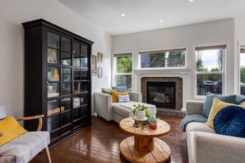 5 Brightonstone Grove Se, Calgary, AB - Indoor Photo Showing Living Room With Fireplace