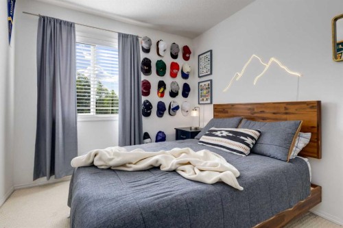 5 Brightonstone Grove Se, Calgary, AB - Indoor Photo Showing Bedroom