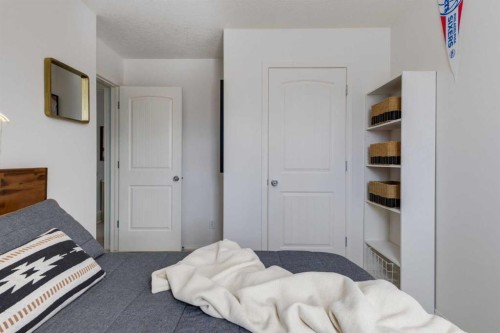 5 Brightonstone Grove Se, Calgary, AB - Indoor Photo Showing Bedroom