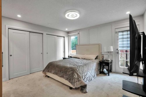 36 Coach Manor Rise Sw, Calgary, AB - Indoor Photo Showing Bedroom