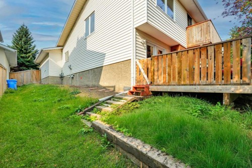 36 Coach Manor Rise Sw, Calgary, AB - Outdoor With Deck Patio Veranda