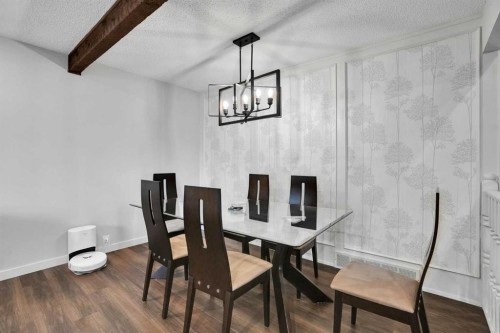 36 Coach Manor Rise Sw, Calgary, AB - Indoor Photo Showing Dining Room