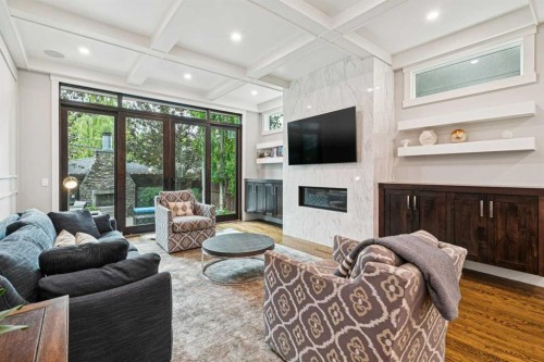 1940 48 Avenue Sw, Calgary, AB - Indoor Photo Showing Living Room With Fireplace