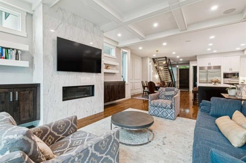 1940 48 Avenue Sw, Calgary, AB - Indoor Photo Showing Living Room With Fireplace