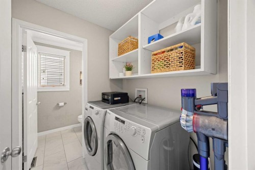 19 Covemeadow Crescent Ne, Calgary, AB - Indoor Photo Showing Laundry Room