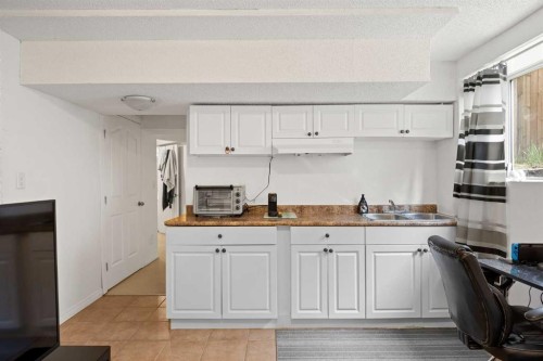 19 Covemeadow Crescent Ne, Calgary, AB - Indoor Photo Showing Kitchen With Double Sink