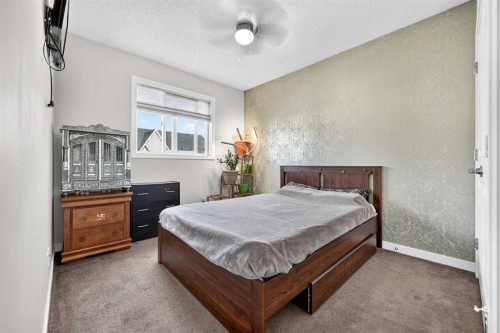 27 Red Embers Lane Ne, Calgary, AB - Indoor Photo Showing Bedroom