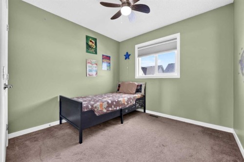27 Red Embers Lane Ne, Calgary, AB - Indoor Photo Showing Bedroom