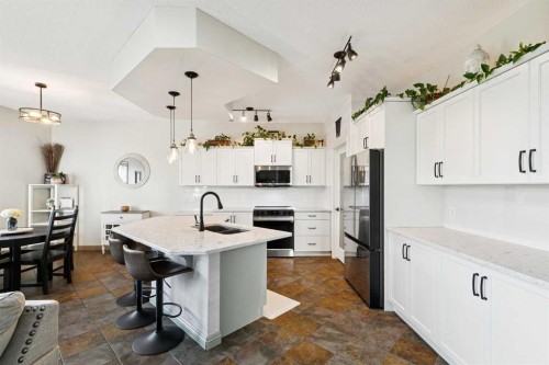 199 Lavender Way, Chestermere, AB - Indoor Photo Showing Kitchen With Double Sink With Upgraded Kitchen