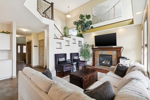 199 Lavender Way, Chestermere, AB - Indoor Photo Showing Living Room With Fireplace