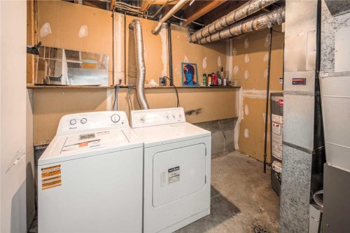 35-4740 Dalton Drive Nw, Calgary, AB - Indoor Photo Showing Laundry Room