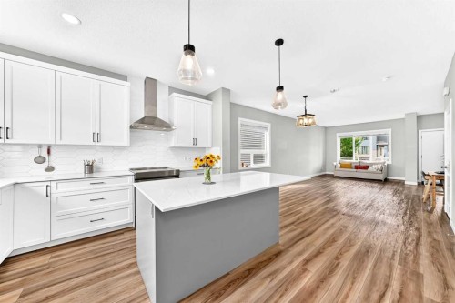 52 Wolf Creek Drive Se, Calgary, AB - Indoor Photo Showing Kitchen With Upgraded Kitchen