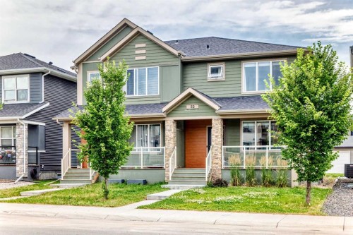 52 Wolf Creek Drive Se, Calgary, AB - Outdoor With Facade