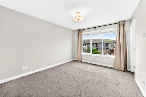 52 Wolf Creek Drive Se, Calgary, AB - Indoor Photo Showing Other Room