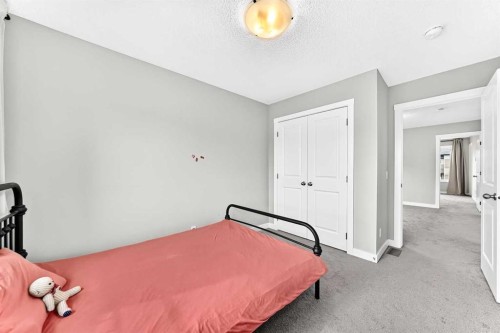 52 Wolf Creek Drive Se, Calgary, AB - Indoor Photo Showing Bedroom