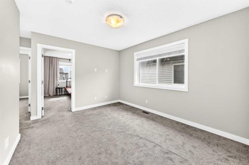 52 Wolf Creek Drive Se, Calgary, AB - Indoor Photo Showing Other Room