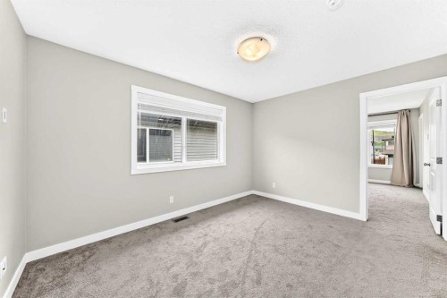 52 Wolf Creek Drive Se, Calgary, AB - Indoor Photo Showing Other Room