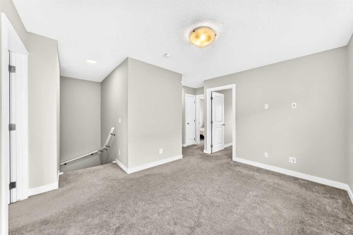 52 Wolf Creek Drive Se, Calgary, AB - Indoor Photo Showing Other Room