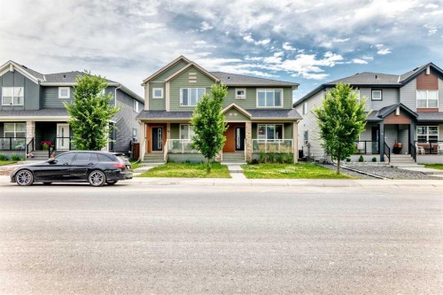 52 Wolf Creek Drive Se, Calgary, AB - Outdoor With Facade