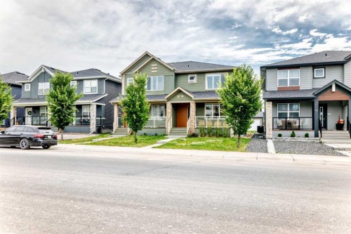 52 Wolf Creek Drive Se, Calgary, AB - Outdoor With Facade