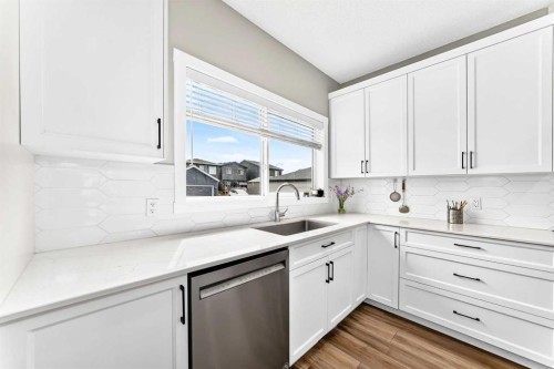 52 Wolf Creek Drive Se, Calgary, AB - Indoor Photo Showing Kitchen