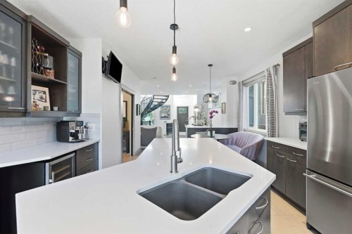 2042 49 Avenue Sw, Calgary, AB - Indoor Photo Showing Kitchen With Double Sink With Upgraded Kitchen