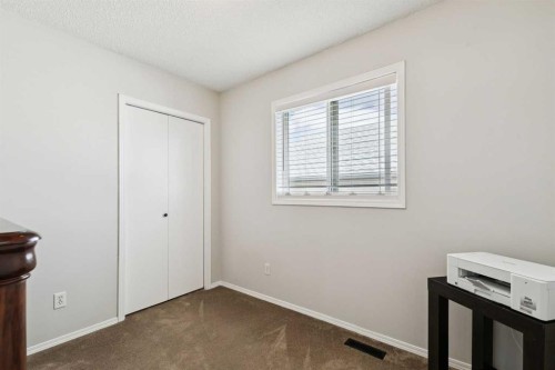 438 Sheep River Point, Okotoks, AB - Indoor Photo Showing Other Room