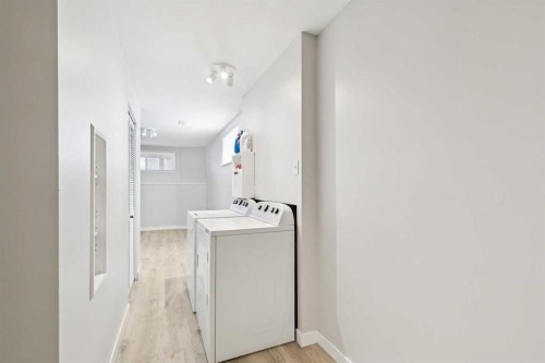 438 Sheep River Point, Okotoks, AB - Indoor Photo Showing Laundry Room
