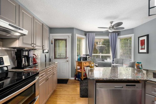 224 Arbour Ridge Way Nw, Calgary, AB - Indoor Photo Showing Kitchen With Upgraded Kitchen