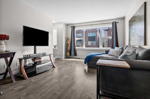 438 Covecreek Circle Ne, Calgary, AB - Indoor Photo Showing Living Room