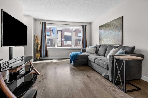 438 Covecreek Circle Ne, Calgary, AB - Indoor Photo Showing Living Room