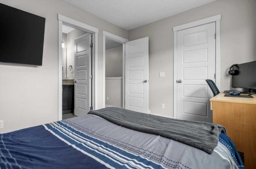438 Covecreek Circle Ne, Calgary, AB - Indoor Photo Showing Bedroom