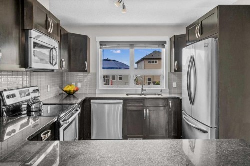438 Covecreek Circle Ne, Calgary, AB - Indoor Photo Showing Kitchen With Stainless Steel Kitchen