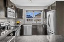 438 Covecreek Circle Ne, Calgary, AB  - Indoor Photo Showing Kitchen With Stainless Steel Kitchen 