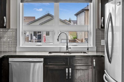 438 Covecreek Circle Ne, Calgary, AB - Indoor Photo Showing Kitchen With Double Sink