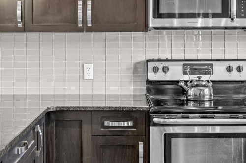438 Covecreek Circle Ne, Calgary, AB - Indoor Photo Showing Kitchen With Stainless Steel Kitchen With Upgraded Kitchen