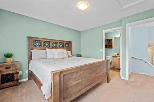 219 New Brighton Landing Se, Calgary, AB - Indoor Photo Showing Bedroom