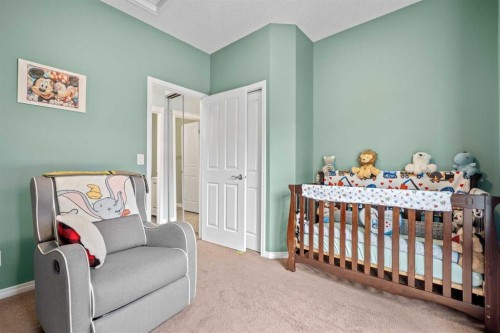 219 New Brighton Landing Se, Calgary, AB - Indoor Photo Showing Bedroom