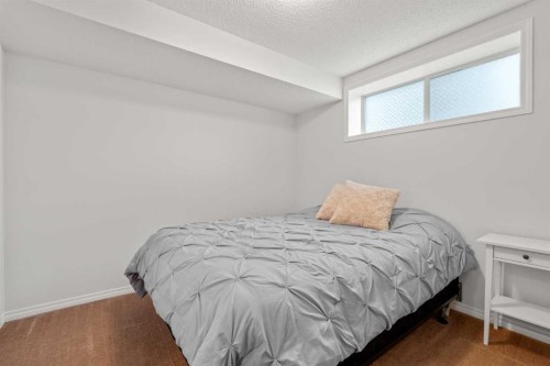 219 New Brighton Landing Se, Calgary, AB - Indoor Photo Showing Bedroom