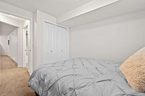 219 New Brighton Landing Se, Calgary, AB - Indoor Photo Showing Bedroom