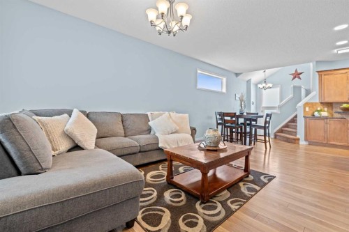 219 New Brighton Landing Se, Calgary, AB - Indoor Photo Showing Living Room