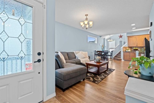 219 New Brighton Landing Se, Calgary, AB - Indoor Photo Showing Living Room